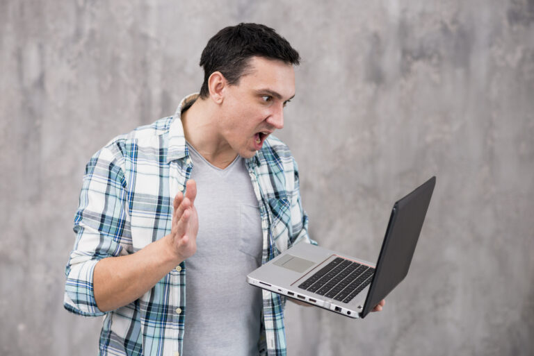 astonished-guy-with-laptop-opened-mouth-scaled