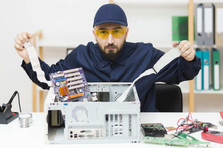 front-view-man-repairing-computer